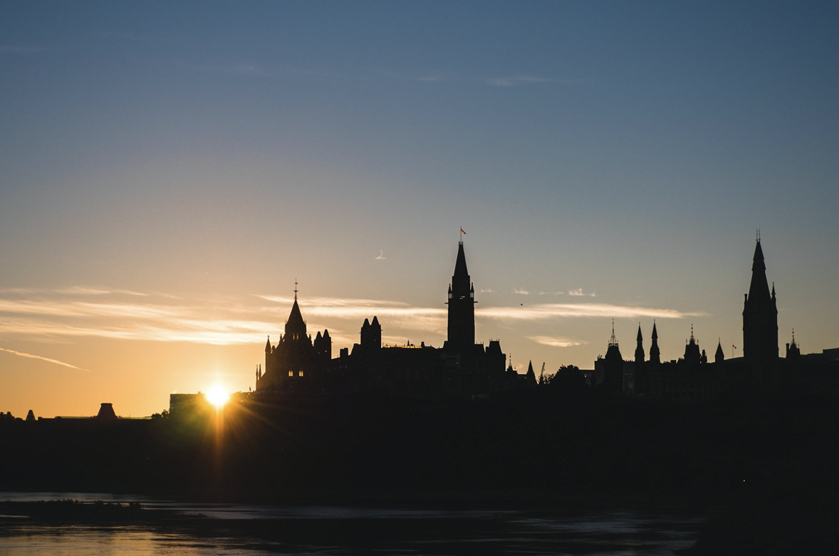 Photo overlooking parliament in Ottawa, Ontario at sunset. 