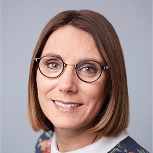 headshot of Annie Pullen Sansfaçon wearing glasses