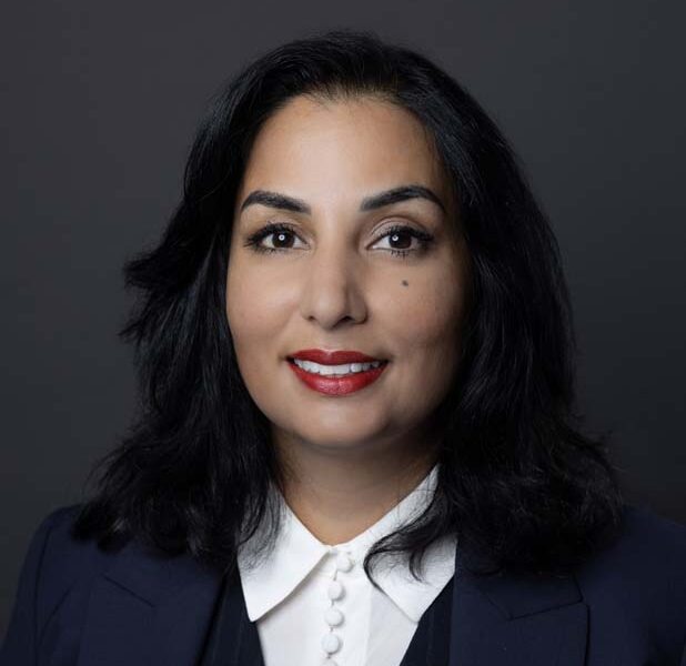 Hon. Niki Sharma, K.C.