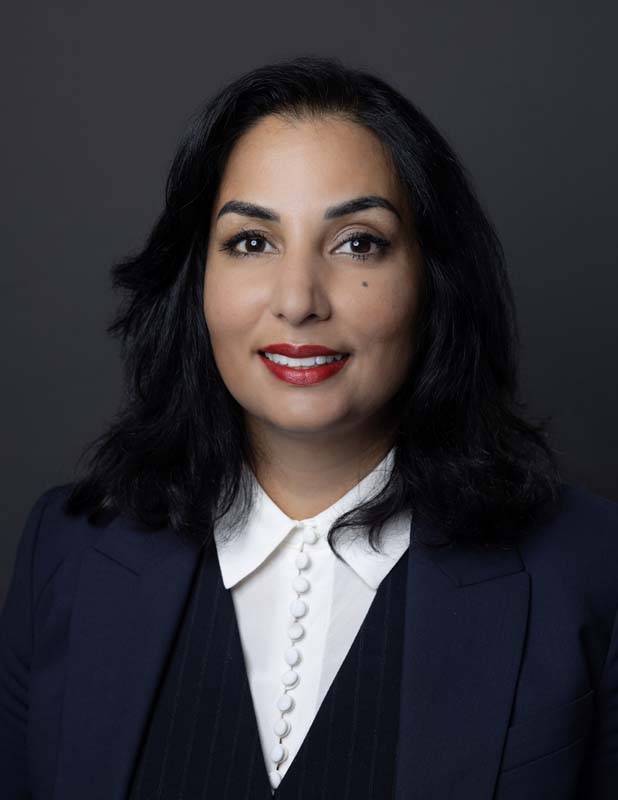 Hon. Niki Sharma, K.C.